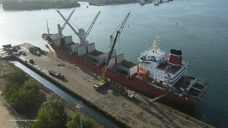 Bulk cargo vessel and quayside operations viewed from above